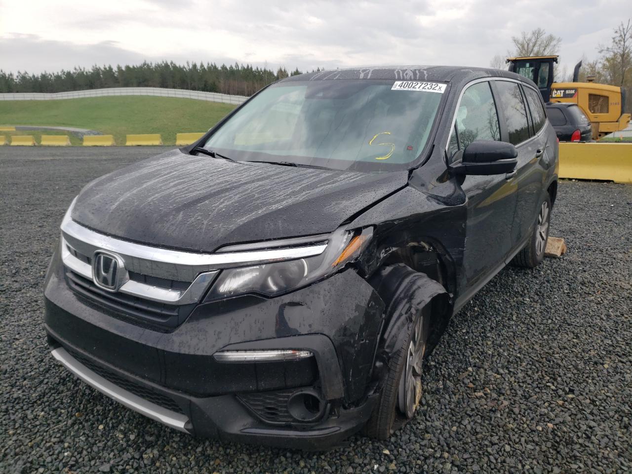 Photo 2 from auction – 2022 HONDA PILOT EXL with VIN 5FNYF5H50NB010065