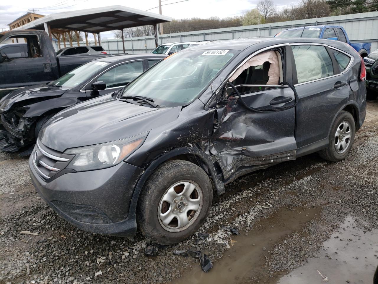 Photo 9 from auction – 2014 HONDA CR-V LX with VIN 3CZRM3H36EG715907
