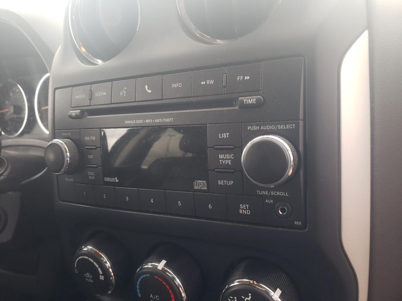 Photo 9 from auction – 2016 JEEP COMPASS LA with VIN 1C4NJCEA8GD785215