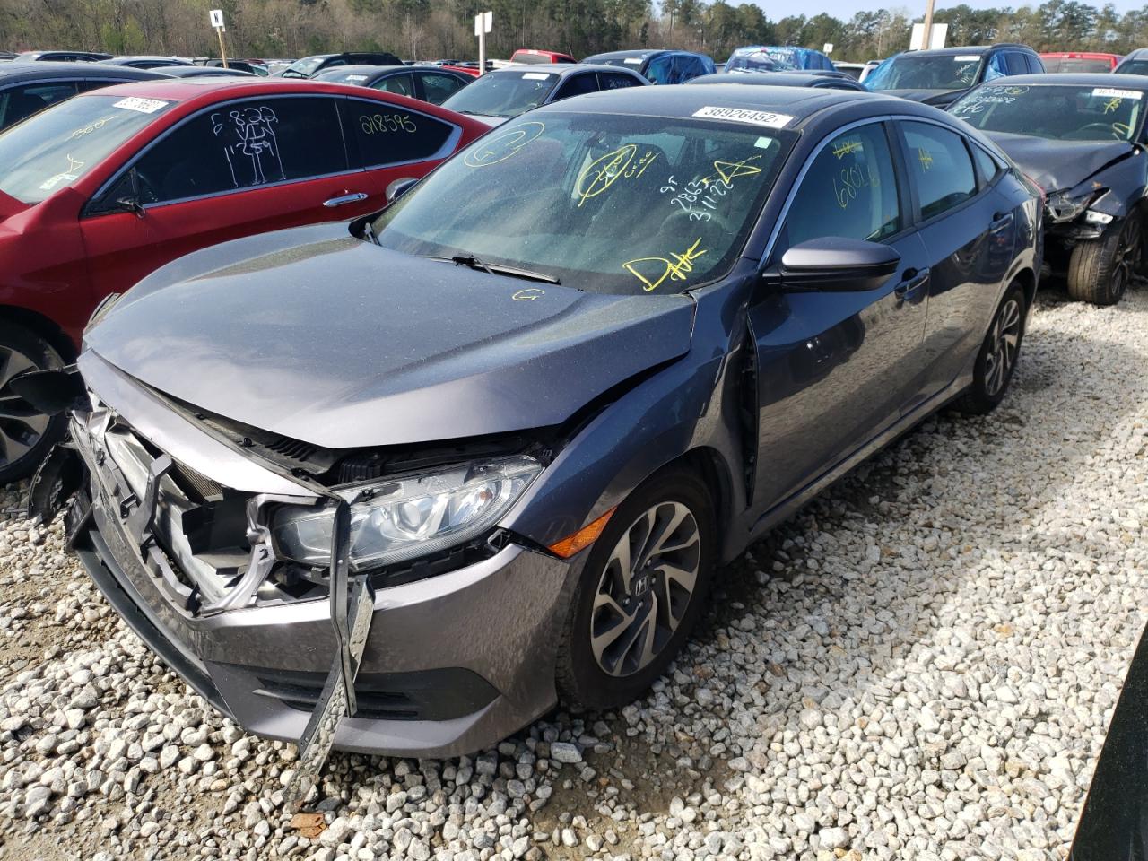 Photo 2 from auction – 2018 HONDA CIVIC EX with VIN 19XFC2F76JE002863