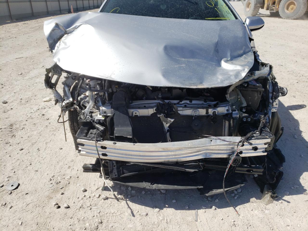 Photo 9 from auction – 2021 TOYOTA COROLLA LE with VIN JTDEAMDE8MJ013174