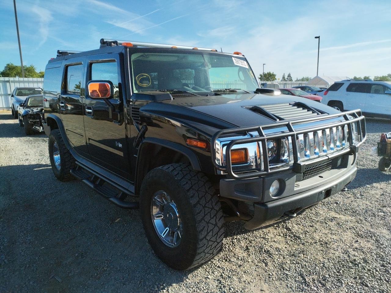 HUMMER H2 2003 with VIN 5GRGN23UX3H101710 - Photo from auction