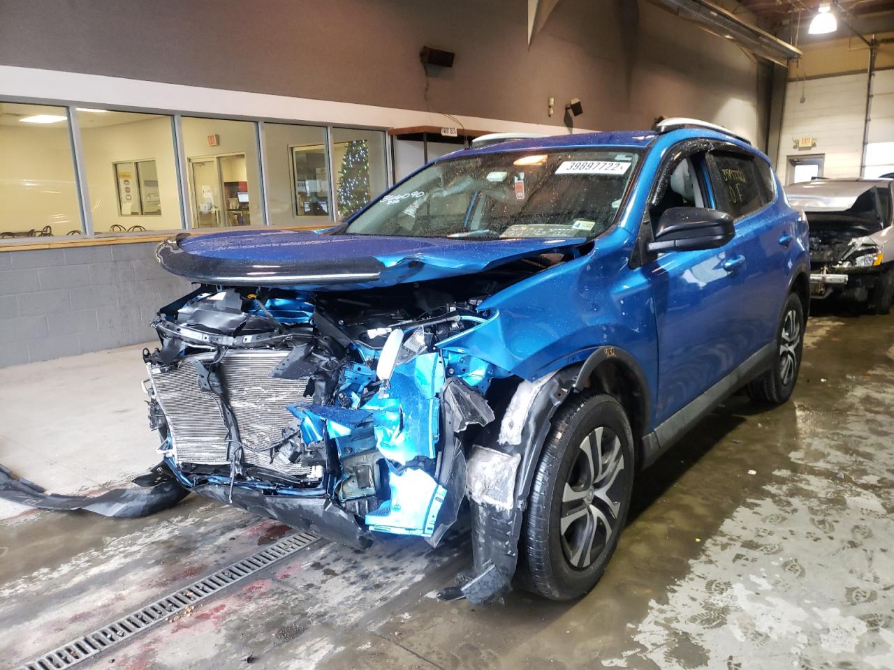 Photo 2 from auction – 2016 TOYOTA RAV4 LE with VIN 2T3ZFREV3GW247694