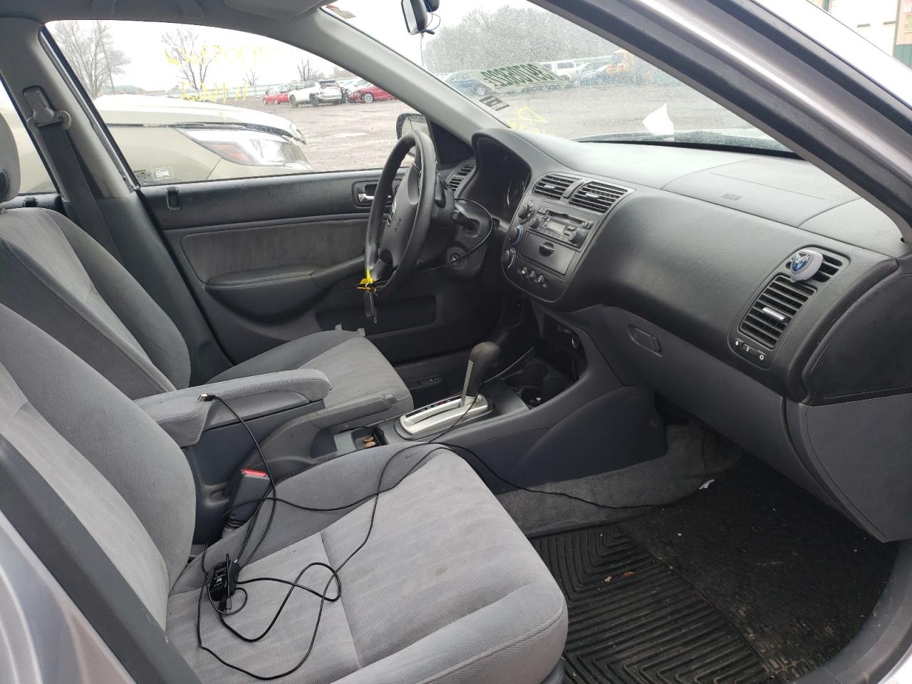 Photo 5 from auction – 2003 HONDA CIVIC LX with VIN 1HGES165X3L024674