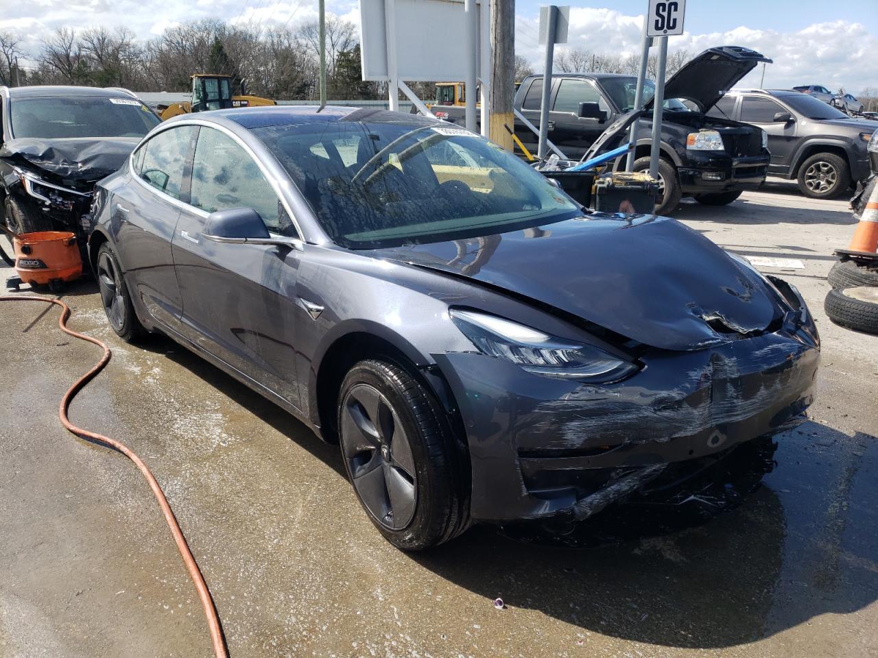 TESLA MODEL 3 2018 with VIN 5YJ3E1EA5JF030460 - Photo from auction