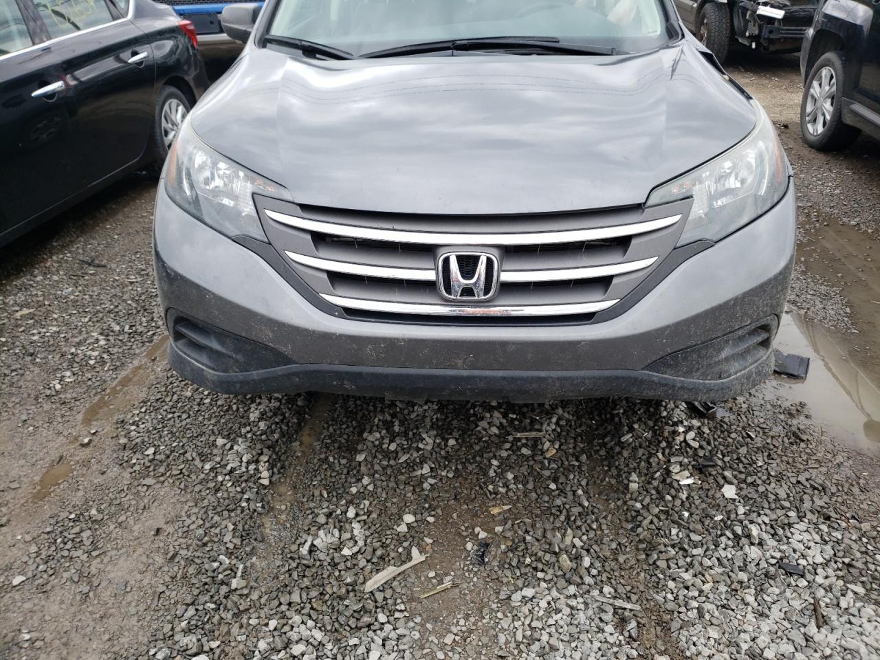 Photo 7 from auction – 2014 HONDA CR-V LX with VIN 3CZRM3H36EG715907