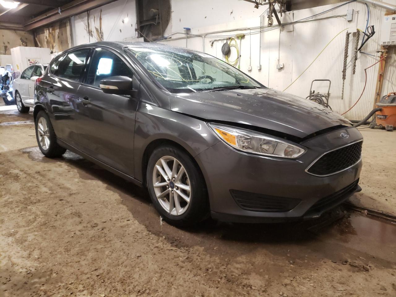 FORD FOCUS SE 2015 with VIN 1FADP3K22FL326652 - Photo from auction