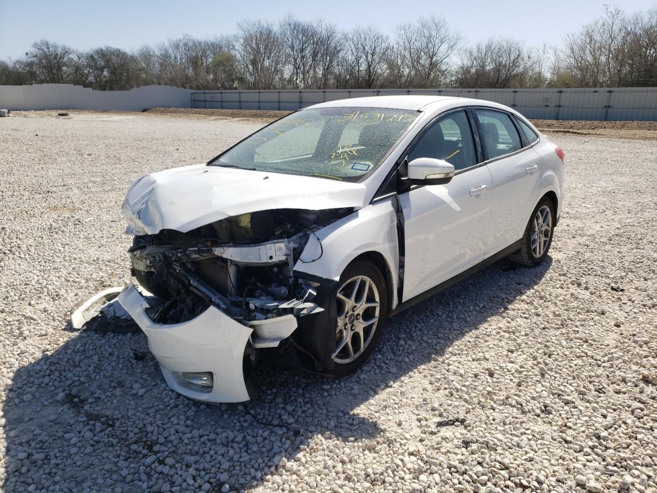 Photo 2 from auction – 2015 FORD FOCUS SE with VIN 1FADP3F21FL276594