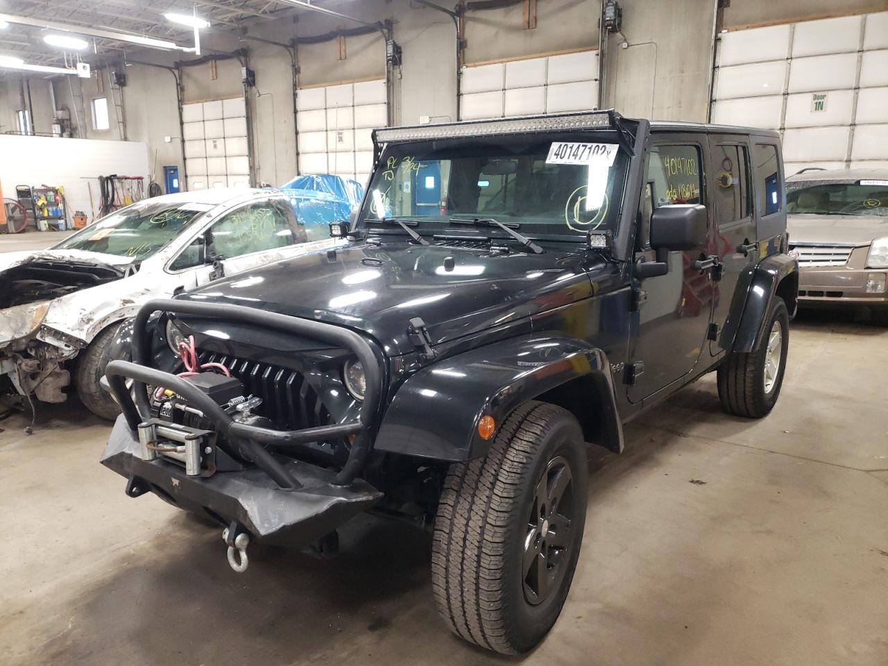 Photo 2 from auction – 2012 JEEP WRANGLER U with VIN 1C4BJWDG2CL251993