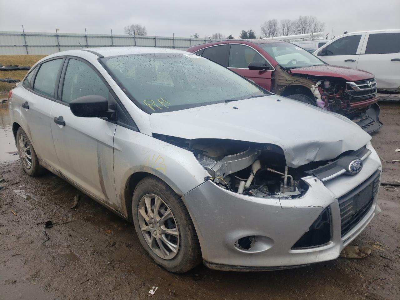 FORD FOCUS S 2013 con VIN 1FADP3E29DL319061 - Foto de la subasta
