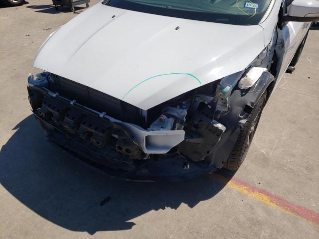 Photo 9 from auction – 2015 FORD FOCUS SE with VIN 1FADP3F23FL219667
