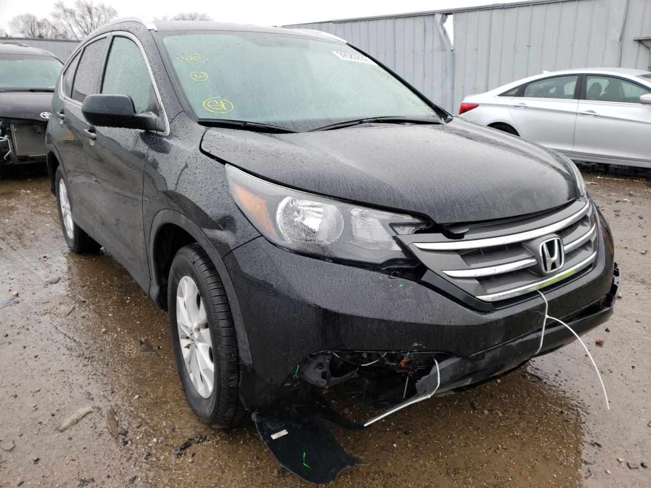 HONDA CR-V EXL 2013 with VIN 2HKRM4H73DH661972 - Photo from auction