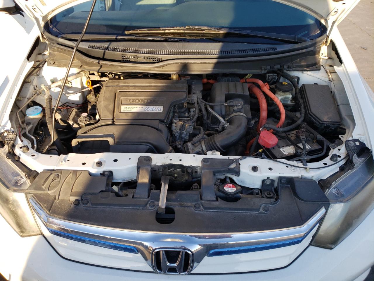 Photo 7 from auction – 2012 HONDA CIVIC HYBR with VIN JHMFB4F29CS000848