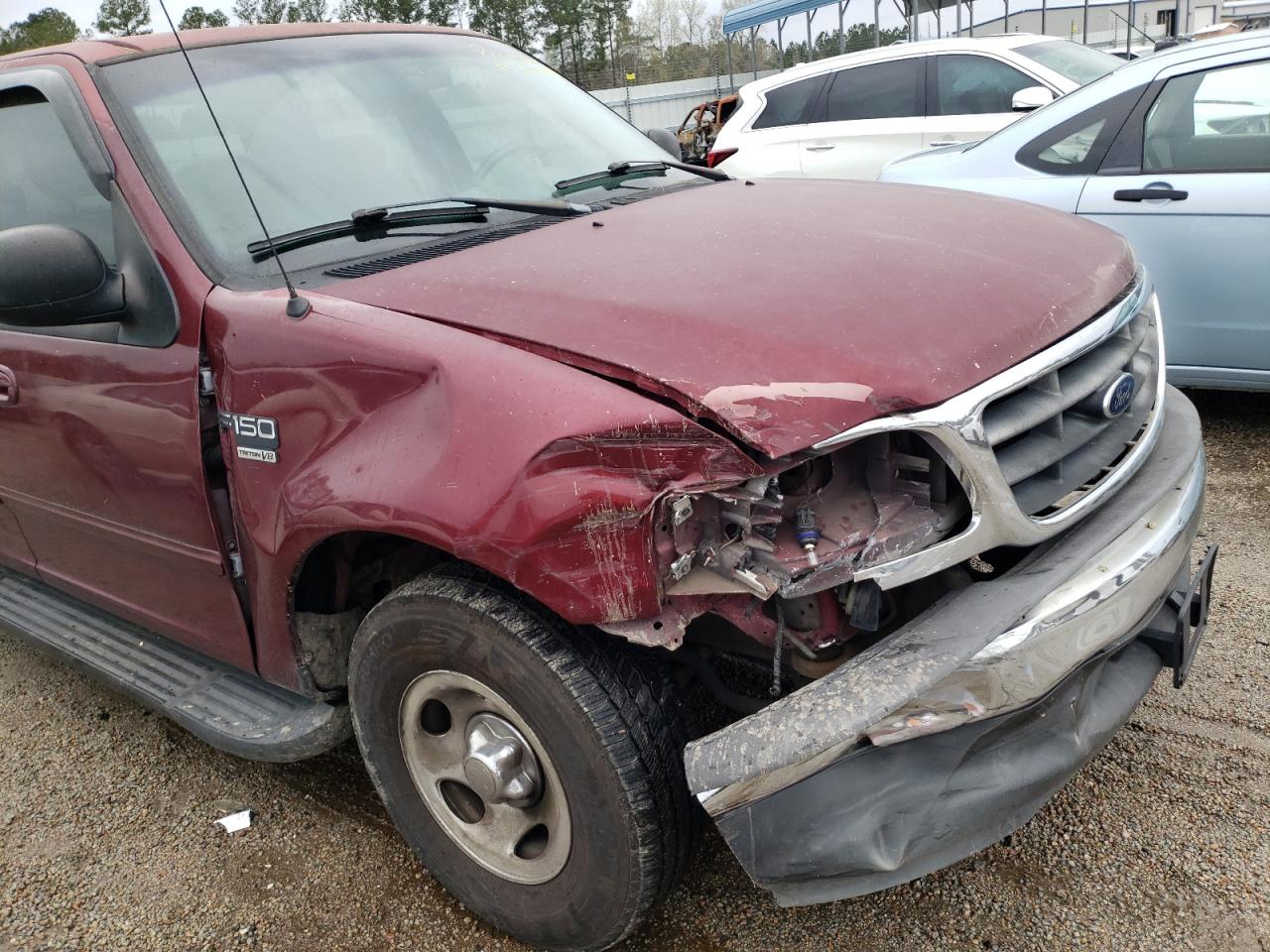 Photo 9 from auction – 2003 FORD F150 SUPER with VIN 1FTRW07633KA74005