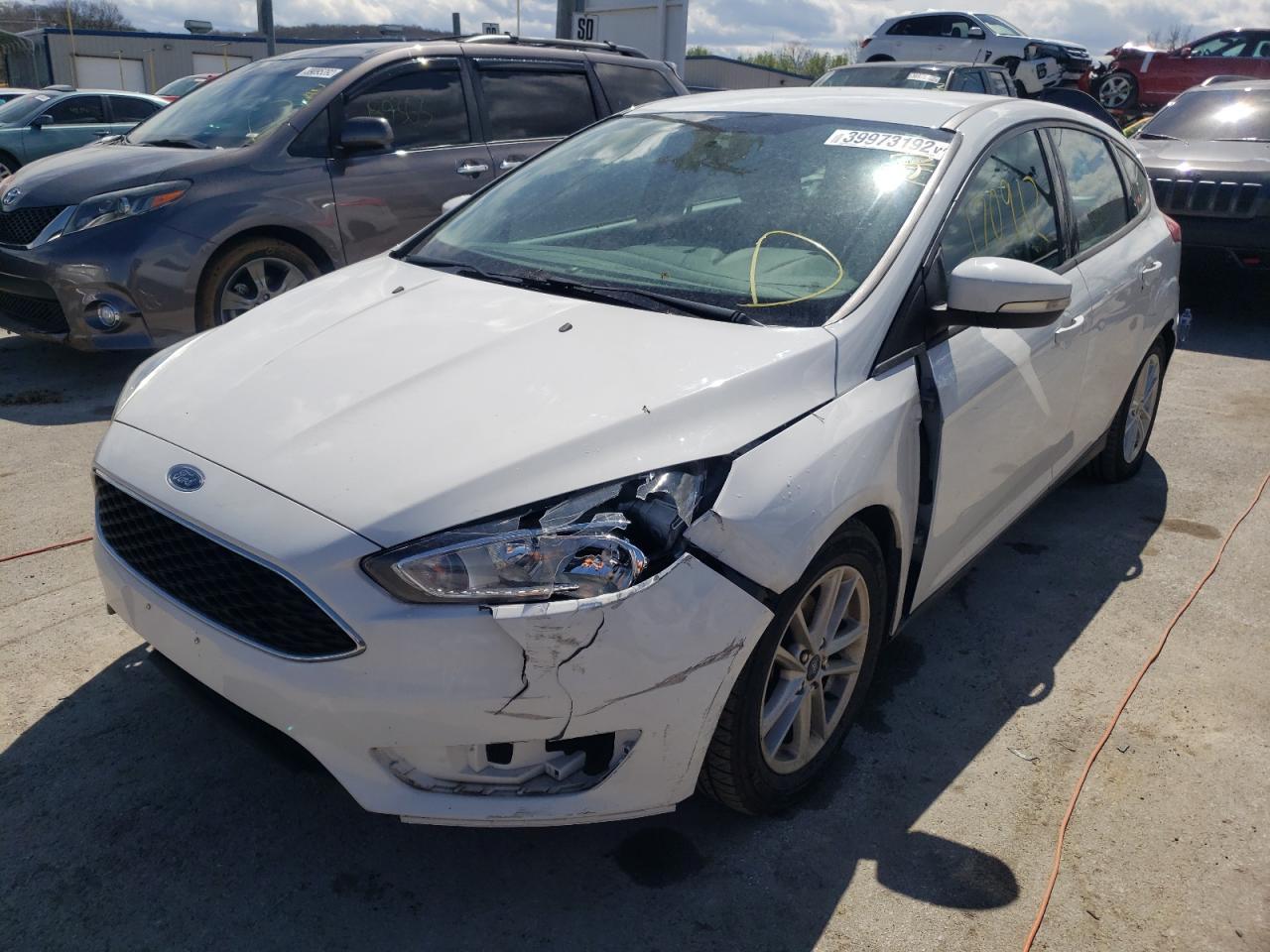 Photo 2 from auction – 2016 FORD FOCUS SE with VIN 1FADP3K26GL392283