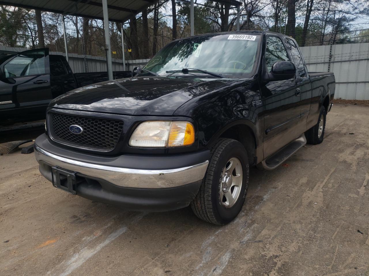 Photo 2 from auction – 2002 FORD F150 with VIN 1FTRX17222KA58750