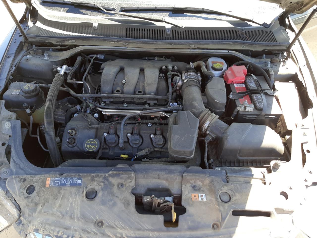 Photo 7 from auction – 2015 FORD TAURUS SEL with VIN 1FAHP2E81FG169846