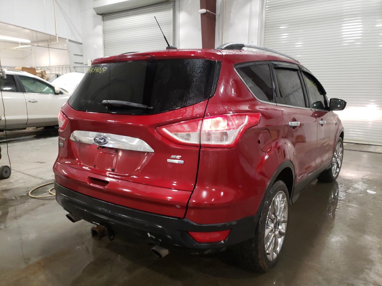 Photo 4 from auction – 2014 FORD ESCAPE SE with VIN 1FMCU9G98EUE57273