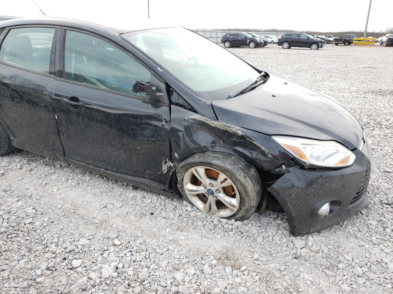 Photo 9 from auction – 2012 FORD FOCUS SE with VIN 1FAHP3F22CL310930