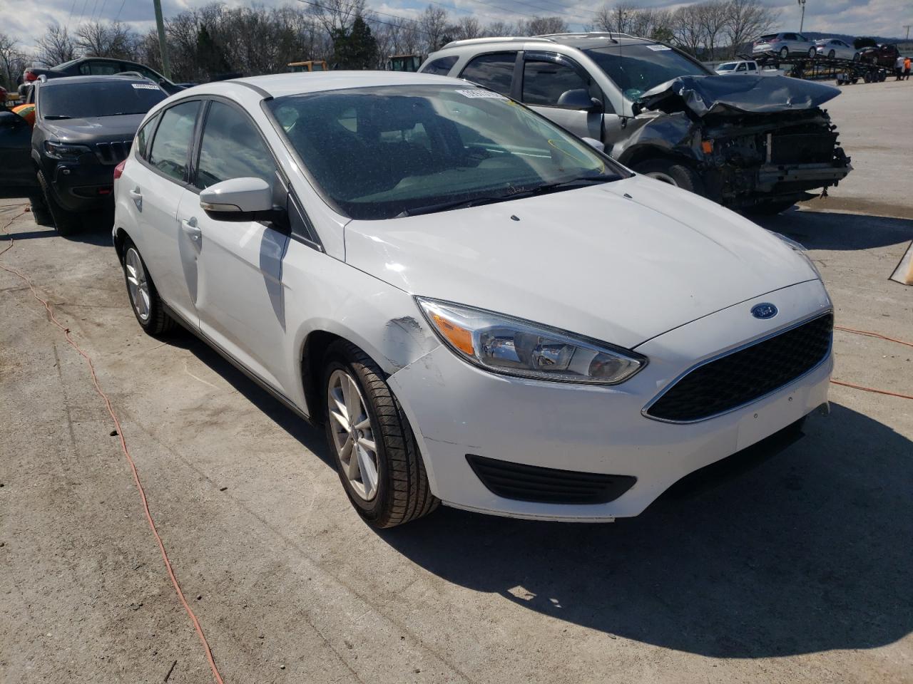 FORD FOCUS SE 2016 with VIN 1FADP3K26GL392283 - Photo from auction