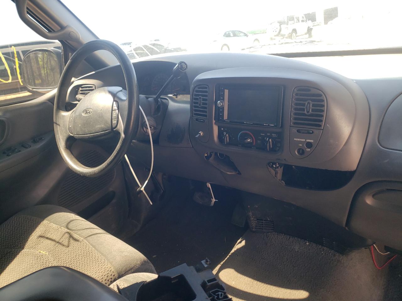 Photo 9 from auction – 2000 FORD F150 with VIN 1FTRF07L4YKA25697