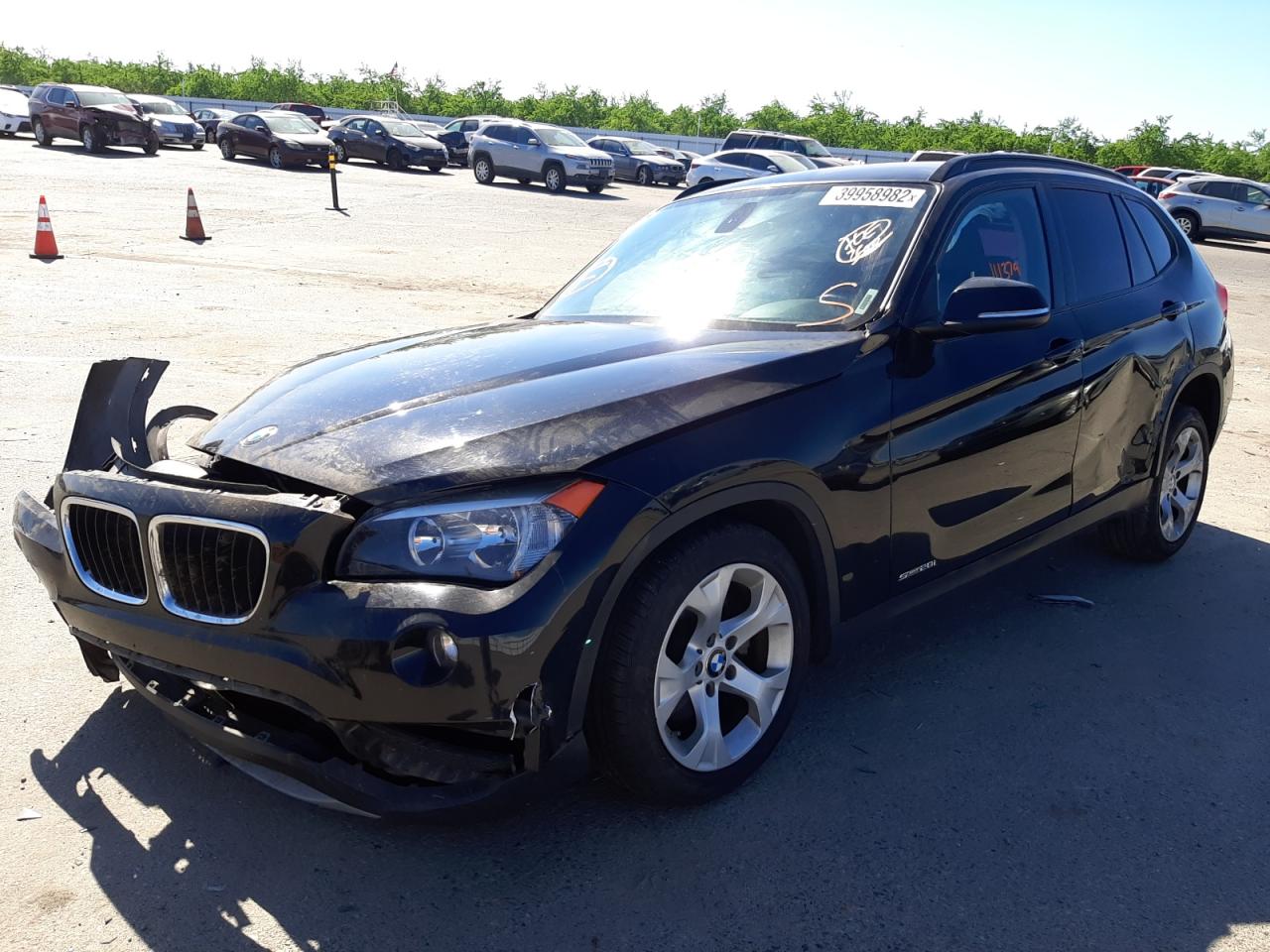 Photo 2 from auction – 2014 BMW X1 SDRIVE2 with VIN WBAVM1C50EVW56259