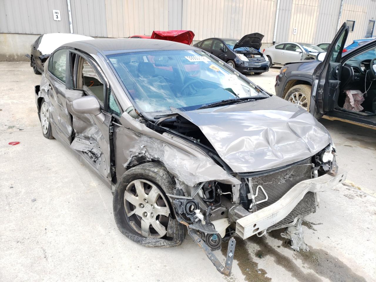 Photo 1 from auction – 2010 HONDA CIVIC LX with VIN 19XFA1F50AE018619