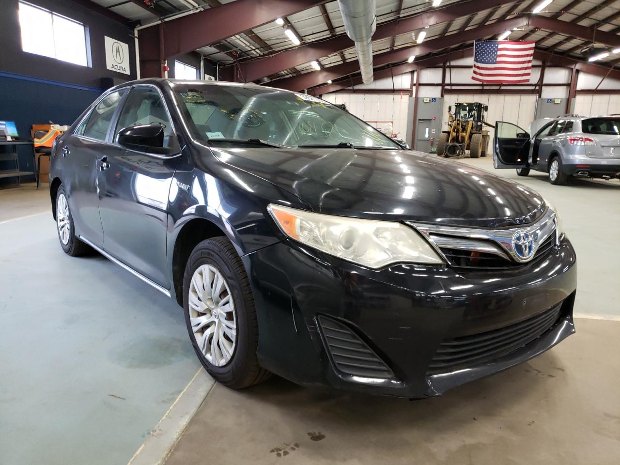 TOYOTA CAMRY HYBR 2012 with VIN 4T1BD1FK6CU010729 - Photo from auction