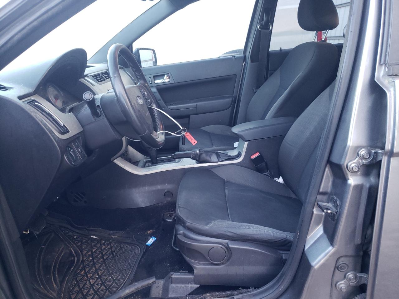 Photo 5 from auction – 2011 FORD FOCUS SES with VIN 1FAHP3GN1BW181083