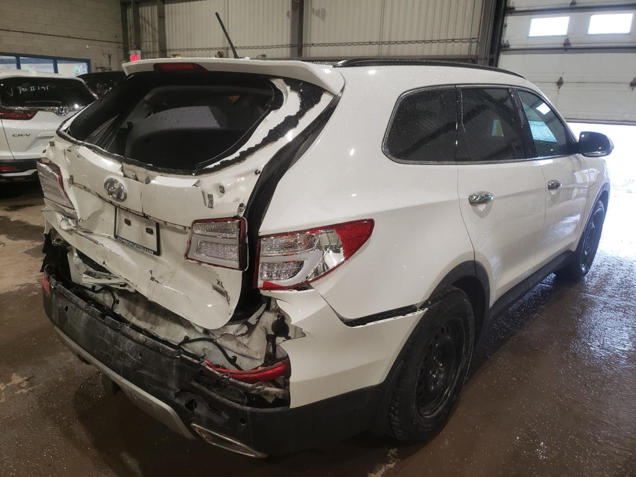 Photo 4 from auction – 2016 HYUNDAI SANTA FE S with VIN KM8SNDHF1GU137232