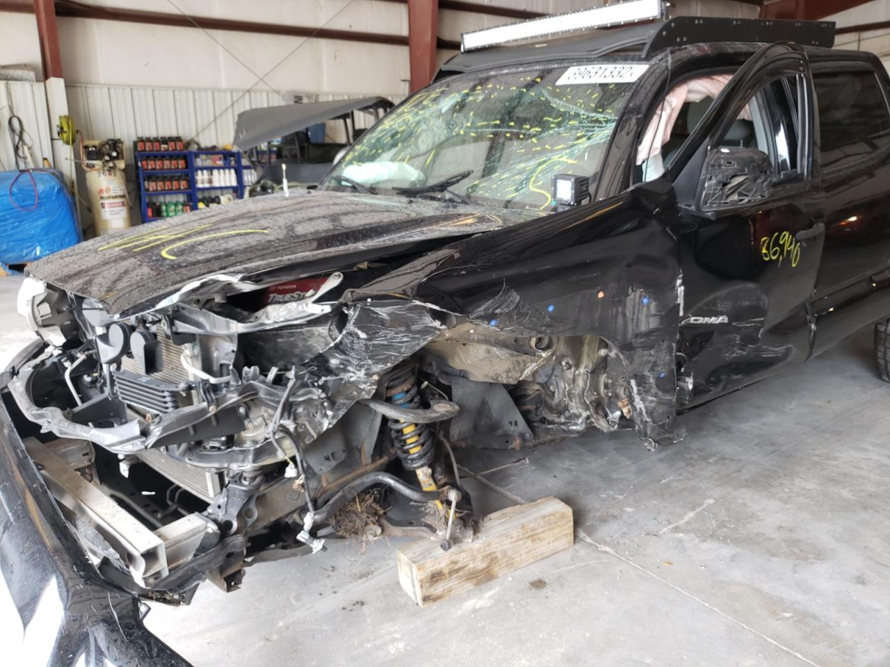 Photo 9 from auction – 2015 TOYOTA TACOMA DOU with VIN 3TMLU4ENXFM166996