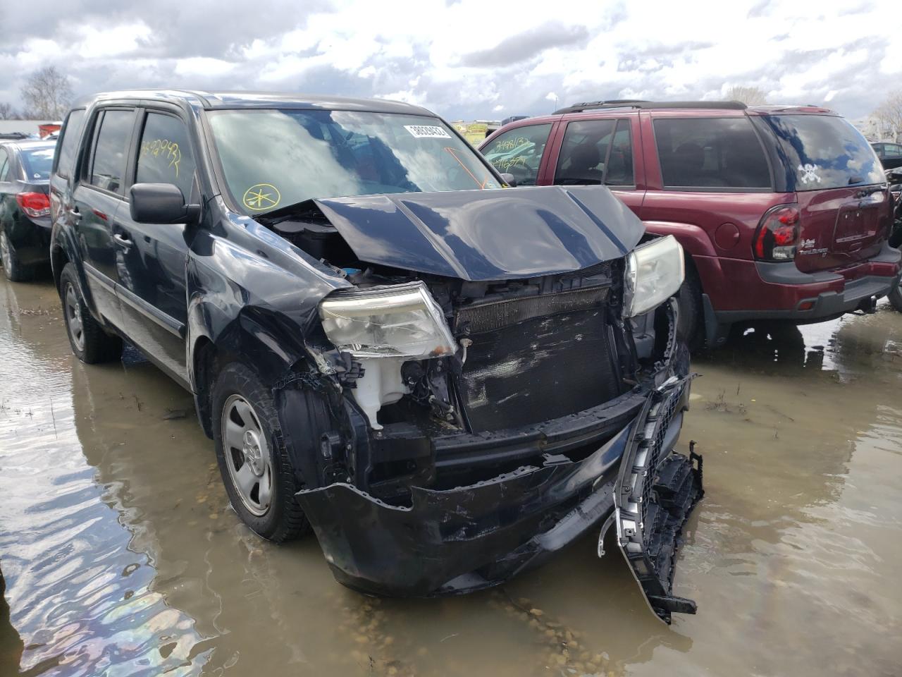 HONDA PILOT LX 2014 with VIN 5FNYF3H25EB012047 - Photo from auction