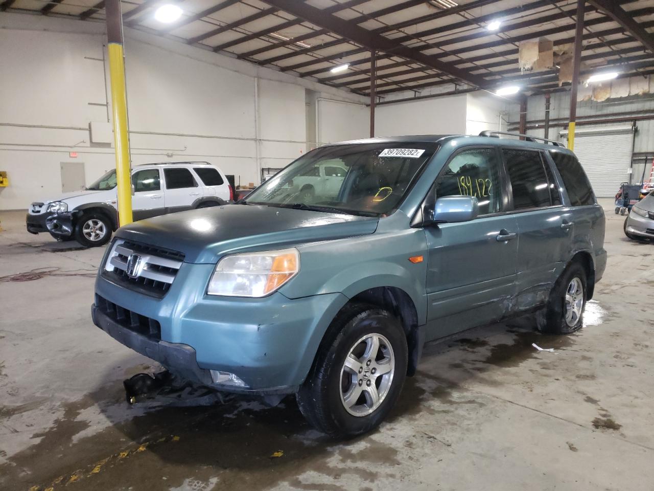 Photo 2 from auction – 2006 HONDA PILOT EX with VIN 5FNYF28506B012043