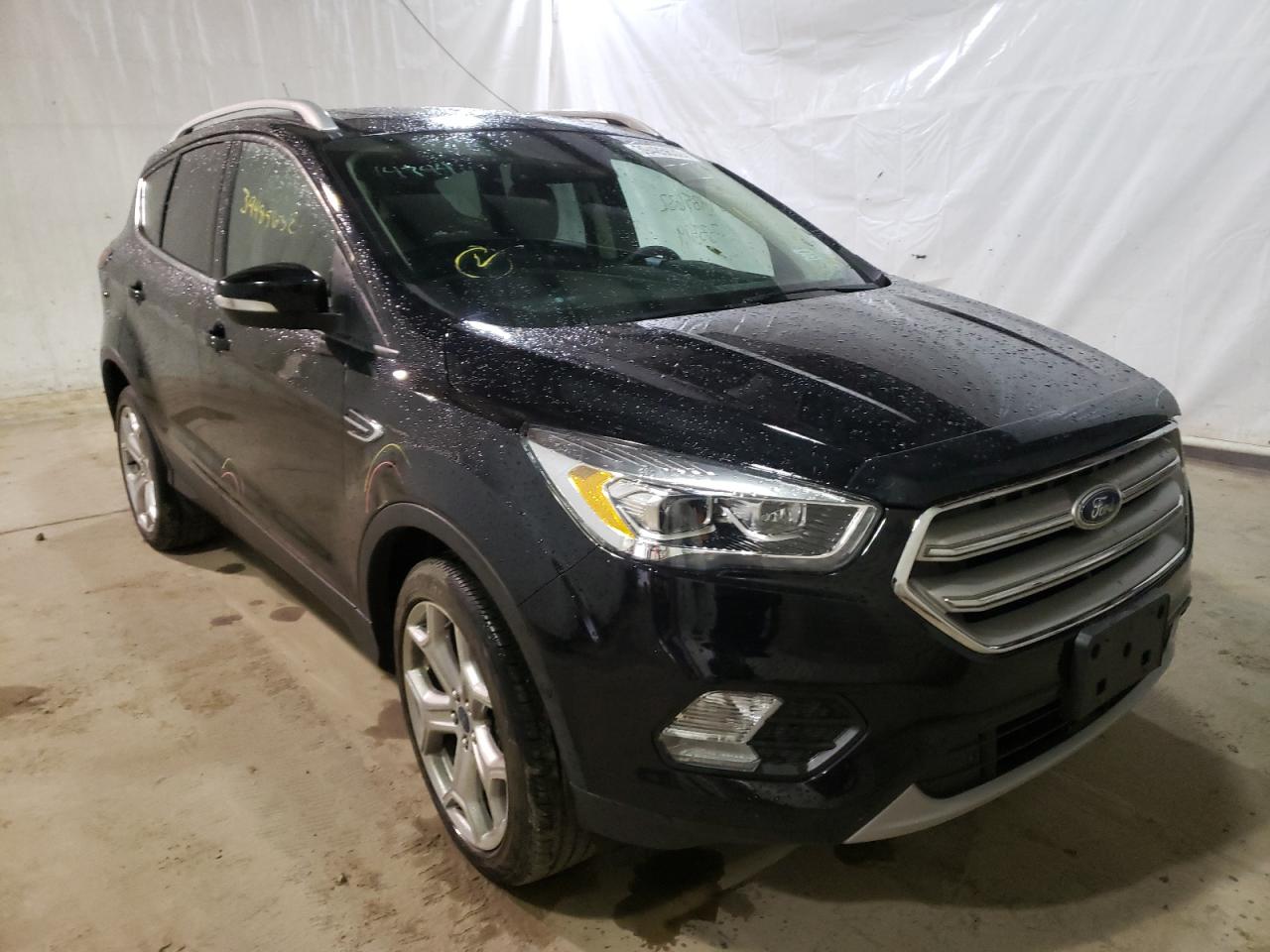 FORD ESCAPE TIT 2019 with VIN 1FMCU9J90KUB07995 - Photo from auction