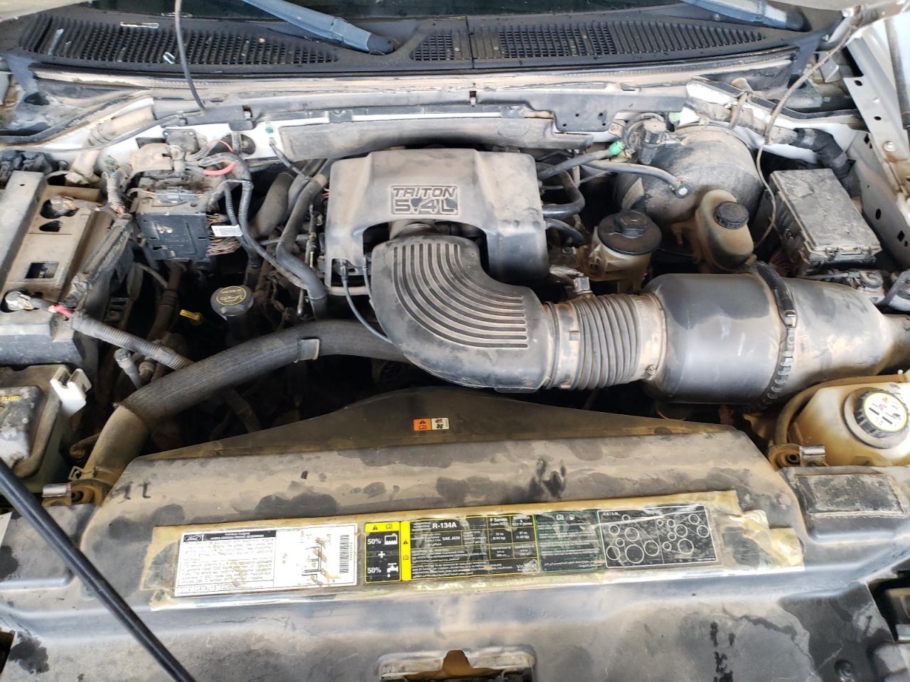 Photo 7 from auction – 2002 FORD F150 with VIN 1FTRX18L02NA88898