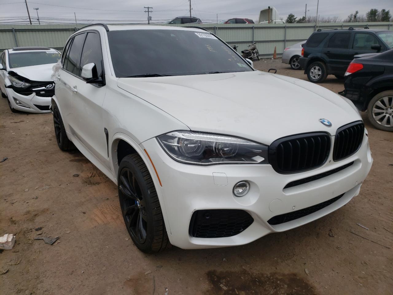 BMW X5 XDRIVE5 2014 with VIN 5UXKR6C53E0J71646 - Photo from auction