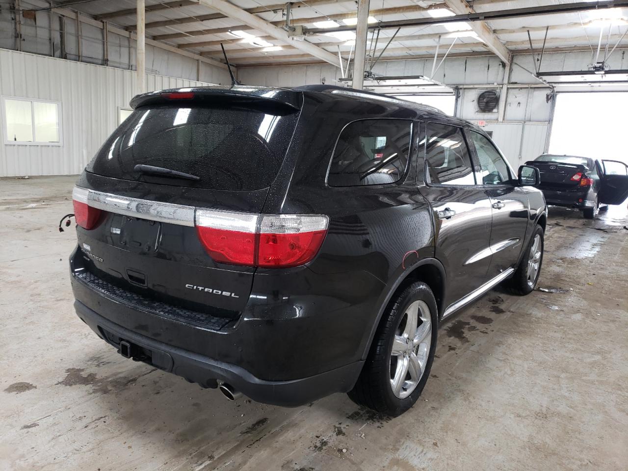 Photo 4 from auction – 2011 DODGE DURANGO with VIN 1D4SE5GT7BC693256