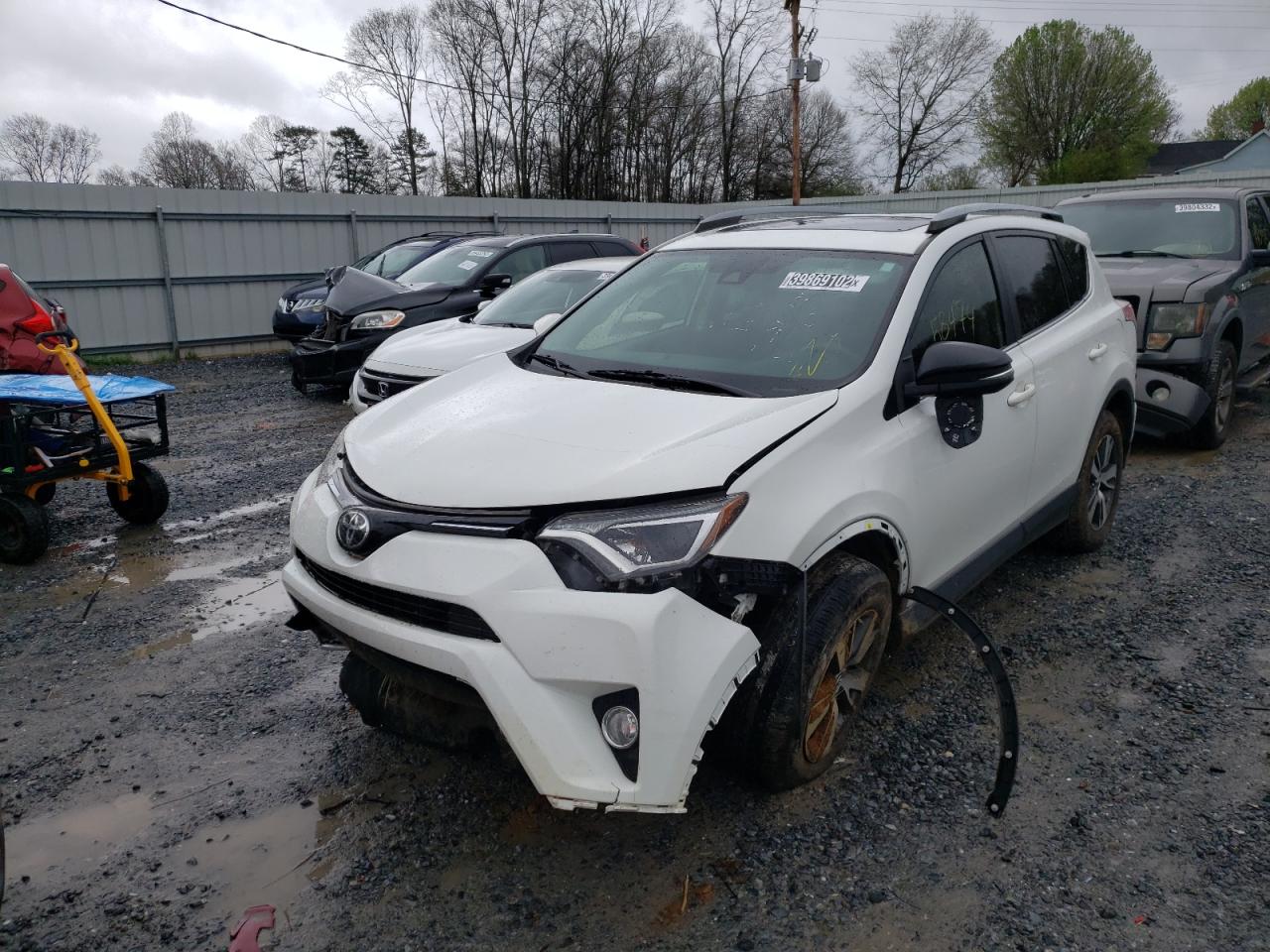 Photo 2 from auction – 2017 TOYOTA RAV4 XLE with VIN JTMWFREV5HD095080