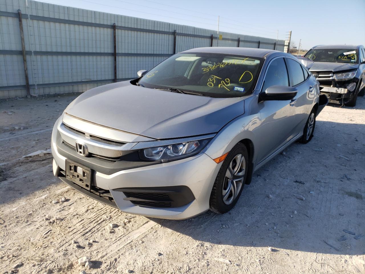 Photo 2 from auction – 2017 HONDA CIVIC LX with VIN 19XFC2F50HE034720