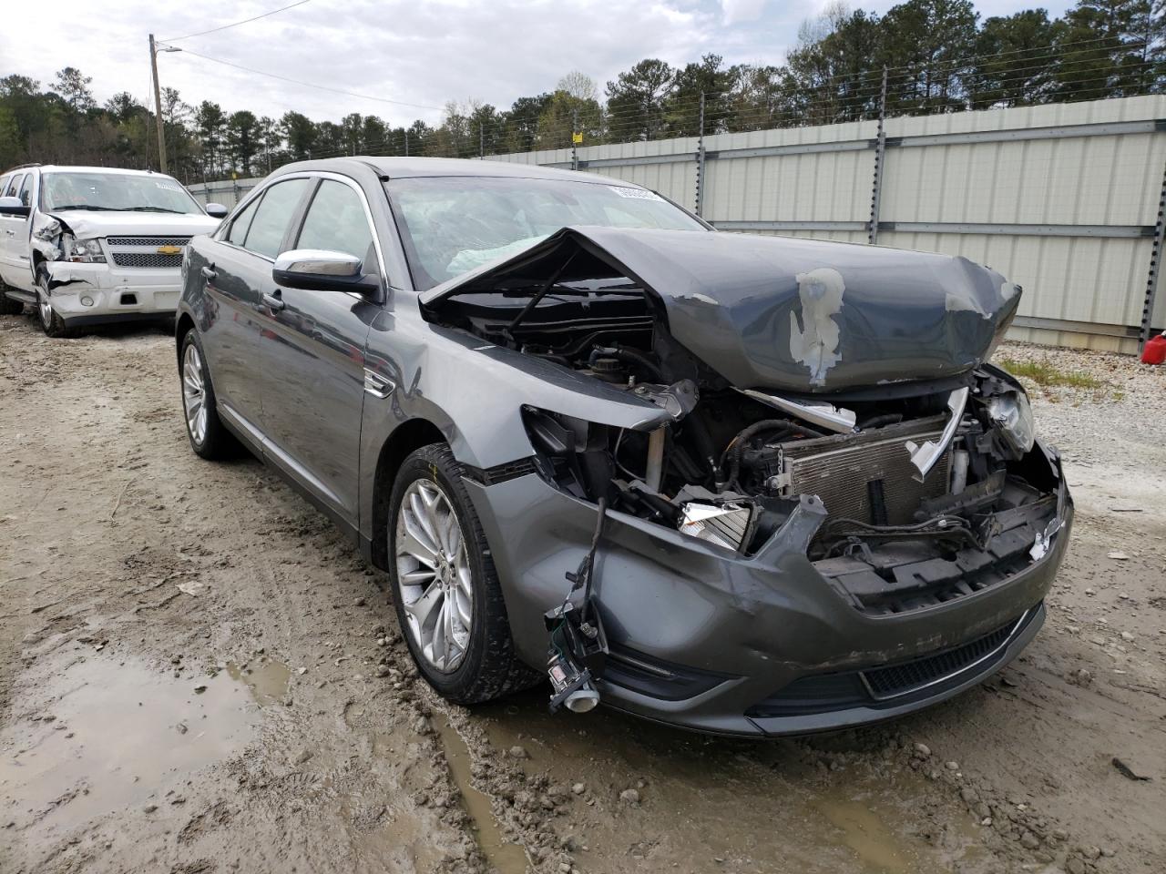 FORD TAURUS LIM 2014 with VIN 1FAHP2F84EG176593 - Photo from auction