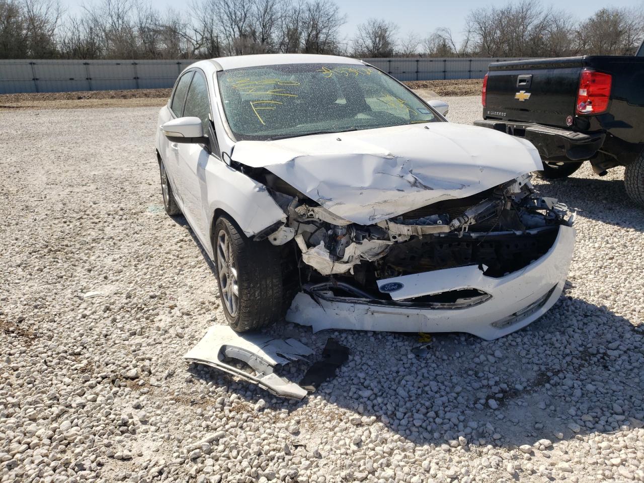 Photo 9 from auction – 2015 FORD FOCUS SE with VIN 1FADP3F21FL276594