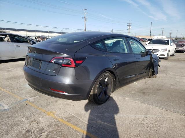 Photo 4 from auction – 2022 TESLA MODEL 3 with VIN 5YJ3E1EB7NF197773