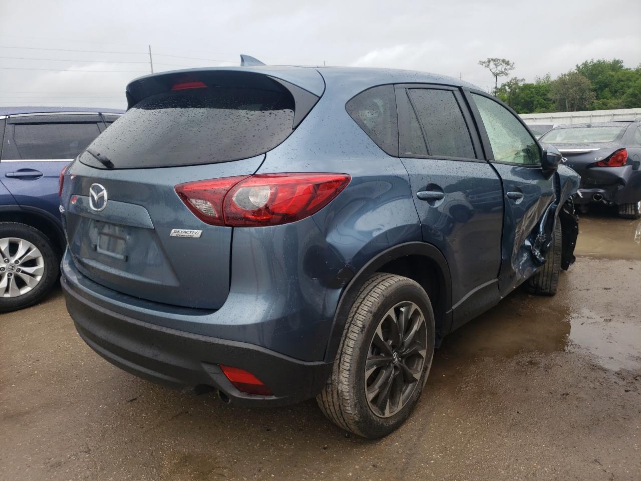 Photo 4 from auction – 2016 MAZDA CX-5 GT with VIN JM3KE2DYXG0667990