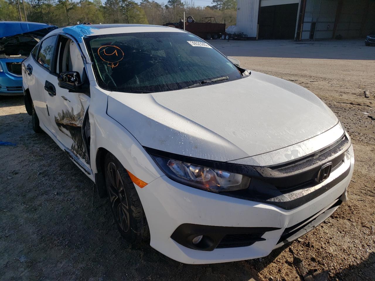 HONDA CIVIC EXL 2017 with VIN 19XFC1F71HE014908 - Photo from auction
