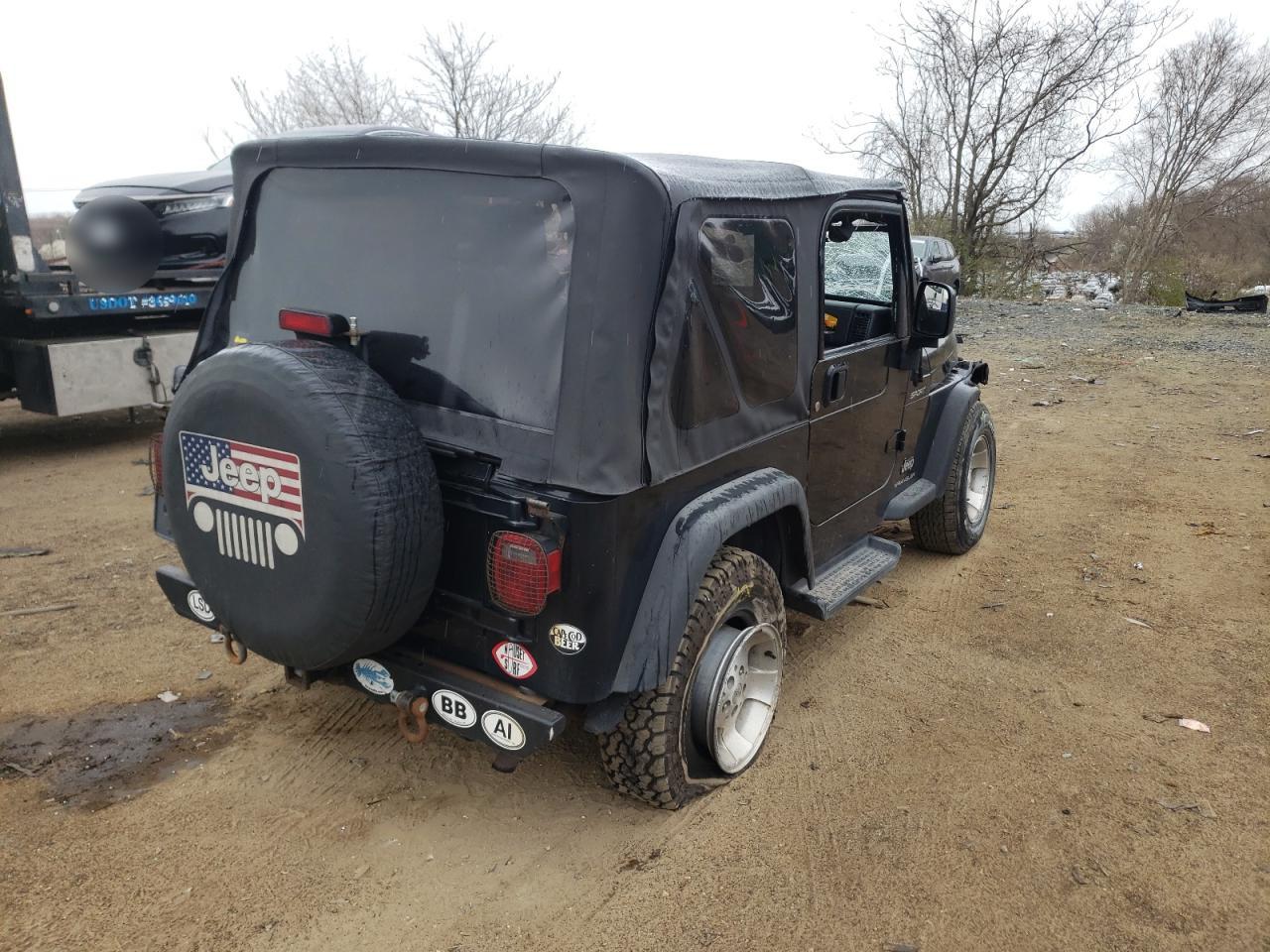 Photo 4 from auction – 2003 JEEP WRANGLER with VIN 1J4FA49S73P344045