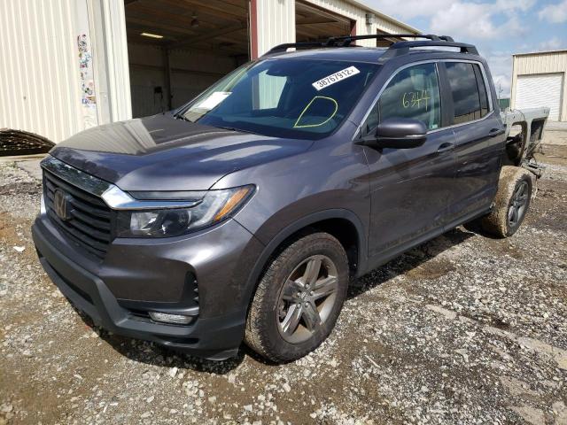 Photo 2 from auction – 2021 HONDA RIDGELINE with VIN 5FPYK3F58MB004975