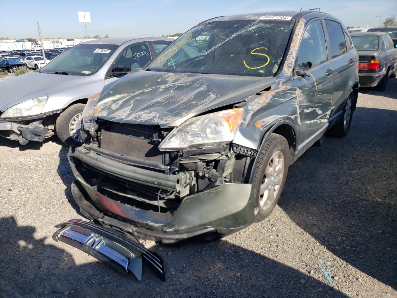 Photo 2 from auction – 2007 HONDA CRV with VIN JHLRE38557C035445