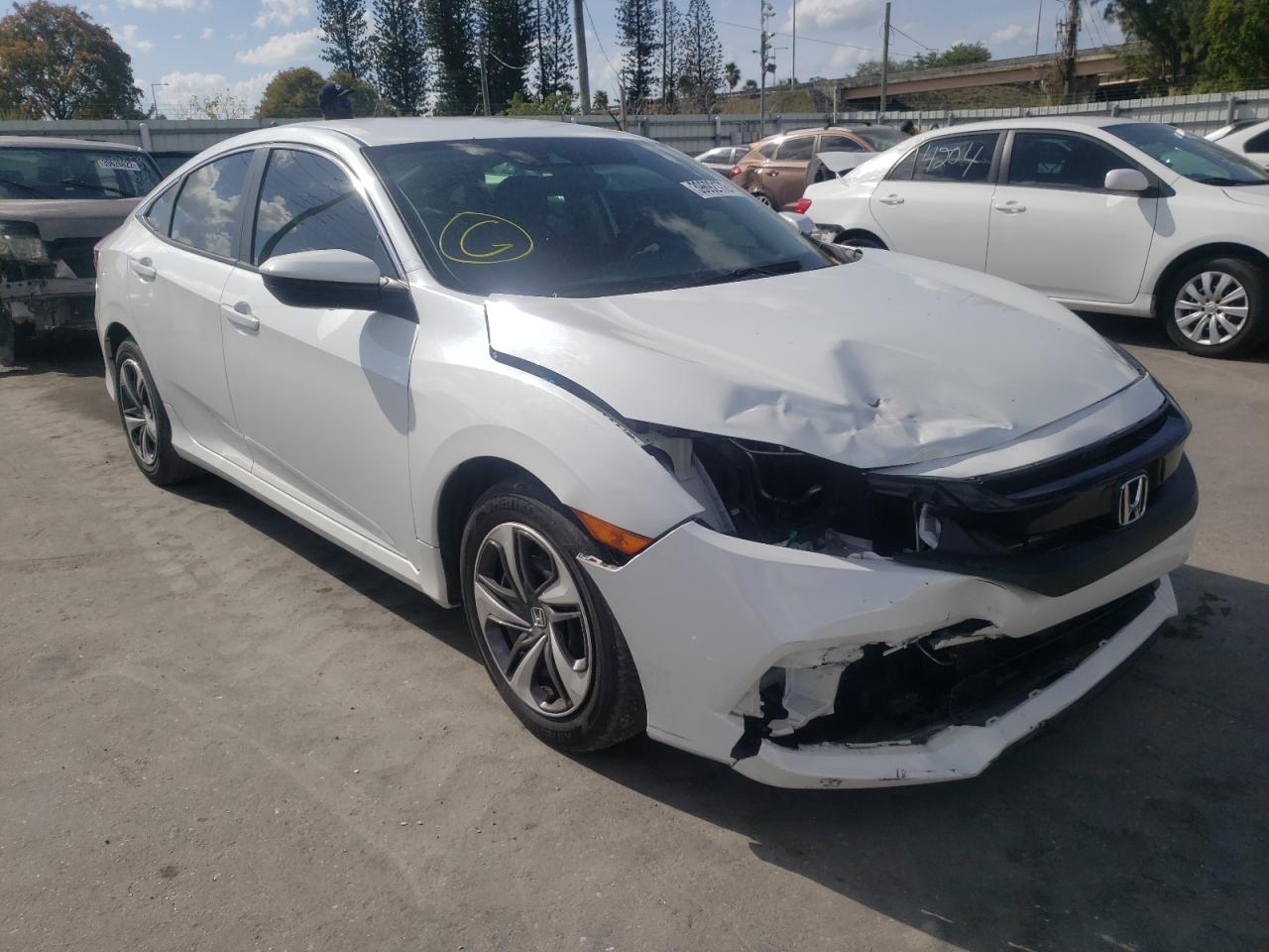 HONDA CIVIC LX 2019 with VIN 19XFC2F68KE017597 - Photo from auction
