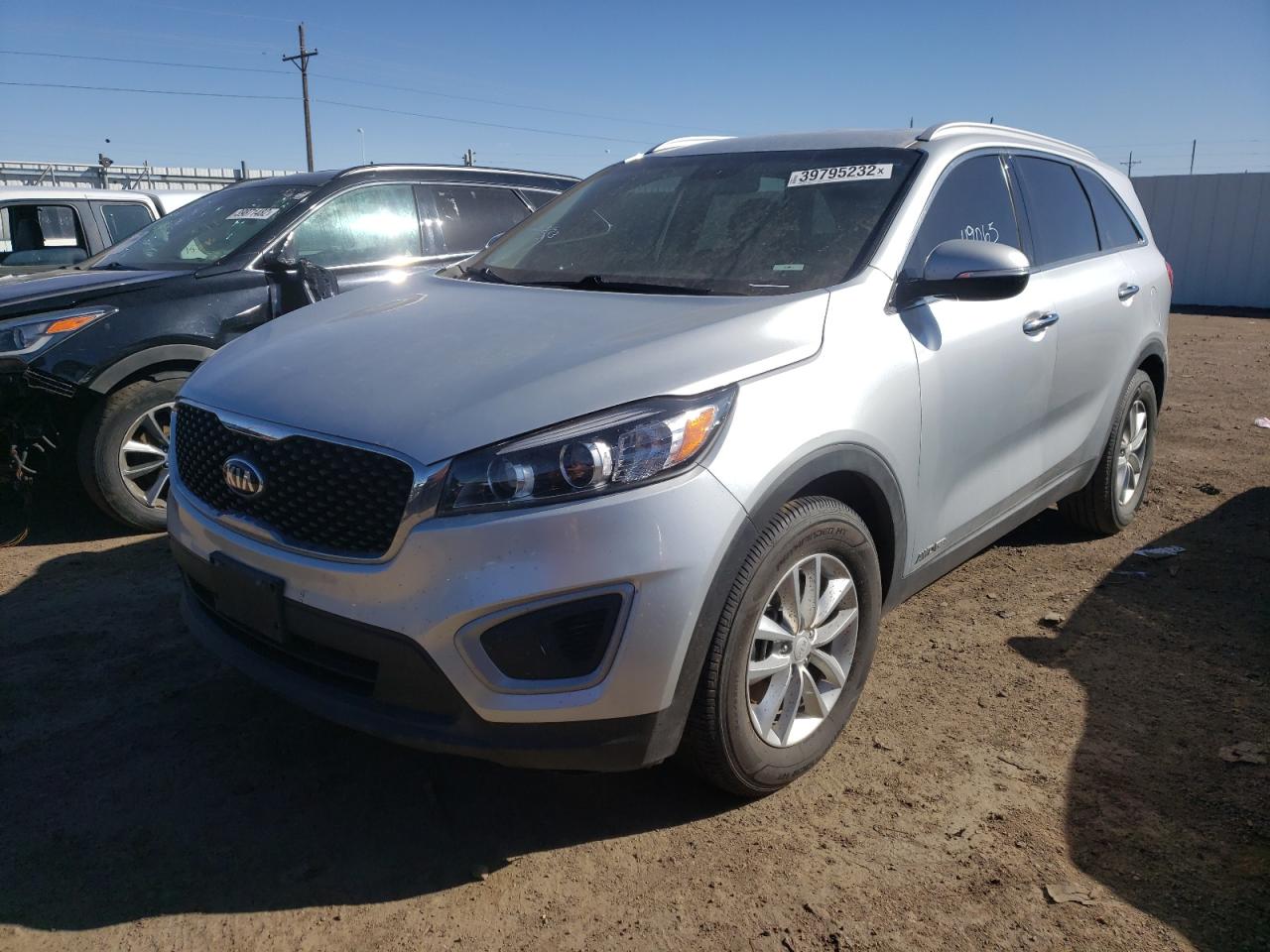 Photo 2 from auction – 2018 KIA SORENTO LX with VIN 5XYPGDA59JG413199
