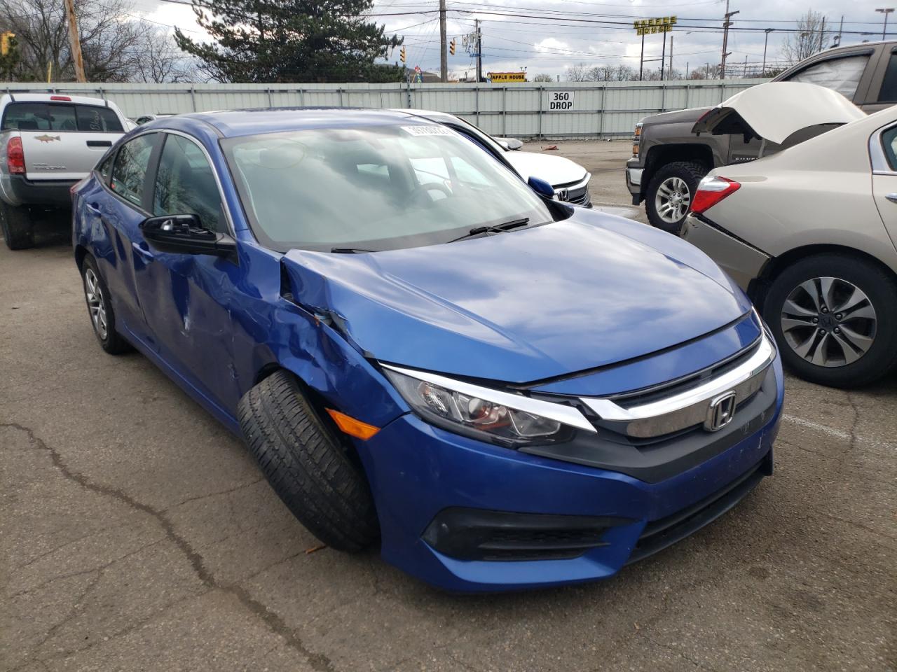 HONDA CIVIC LX 2018 with VIN 2HGFC2F53JH567835 - Photo from auction